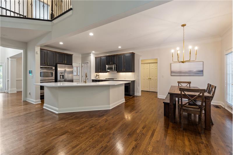 Remodeled kitchen with large island, quartz counters