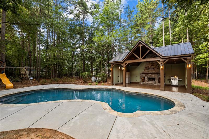 Salt water pool and cabana are perfect for cooling off on hot days, as well as for entertaining.