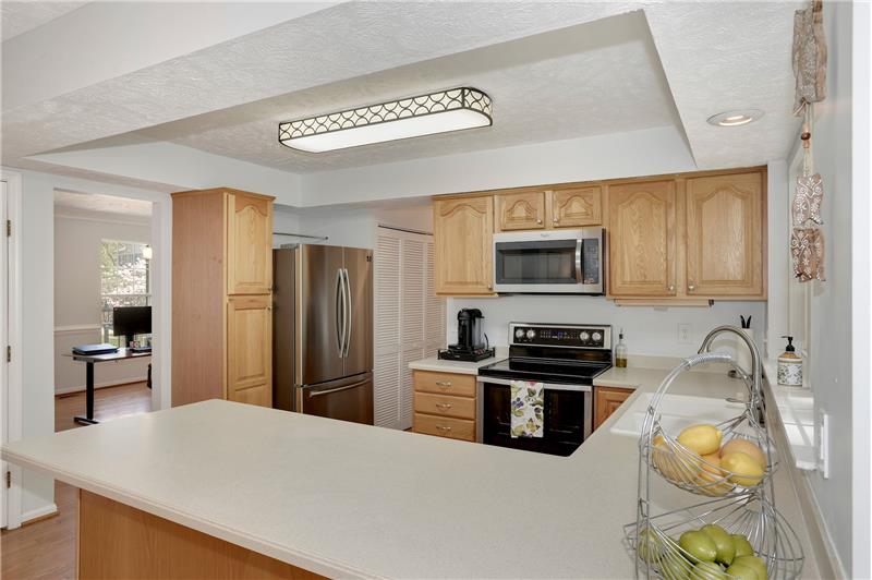 Kitchen has Updated Stainless Steel Appliances