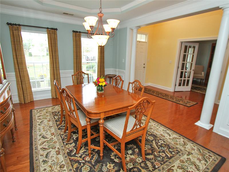 Beautiful wood flooring from entry through great room