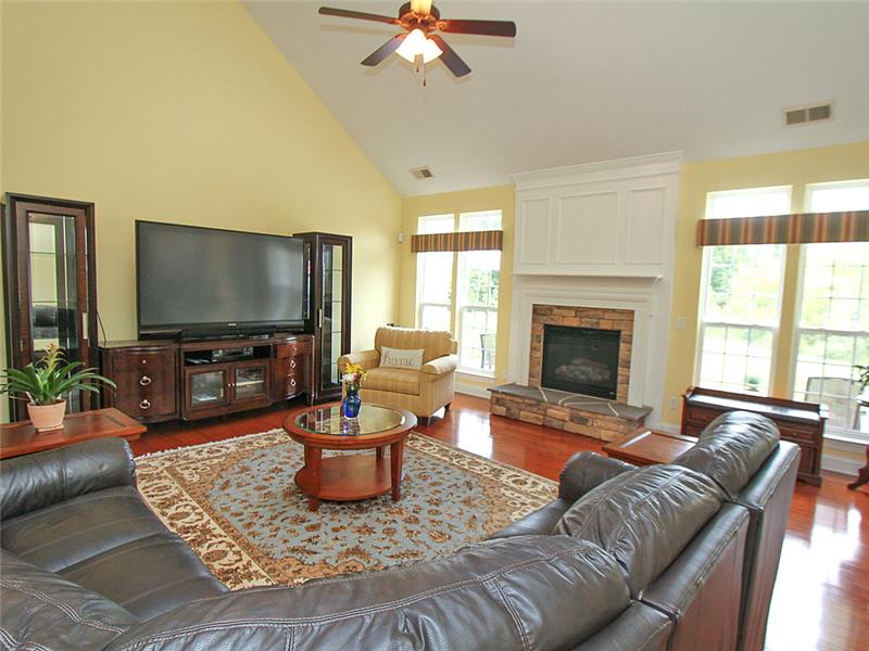Two-story great room with handsome fireplace