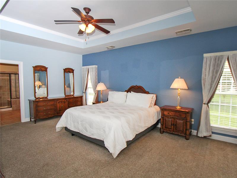 Main level primary bedroom suite