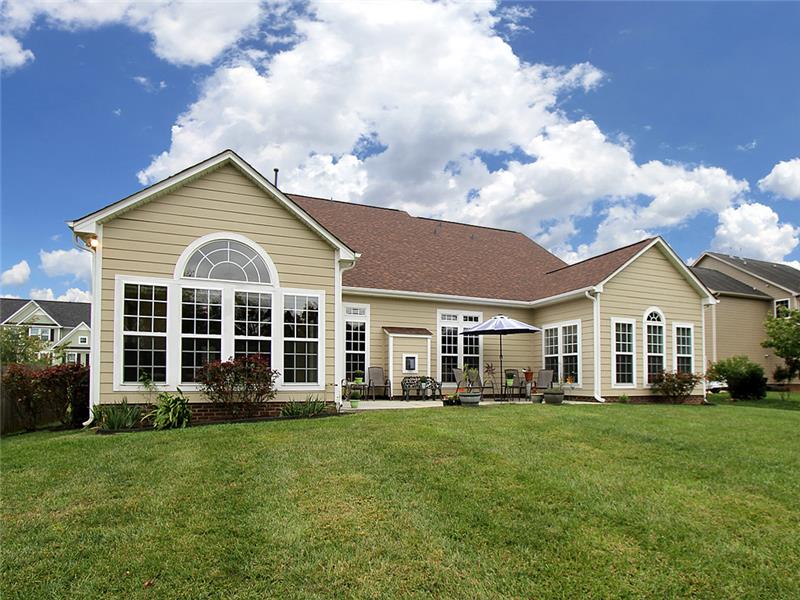 Wall of windows across back of home