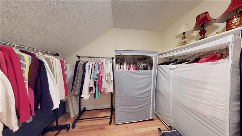 This is a huge closet with hardwood floors on the second floor!