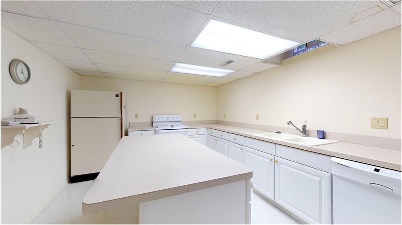 Second kitchen in the basement makes that extra food preparation so much easier!
