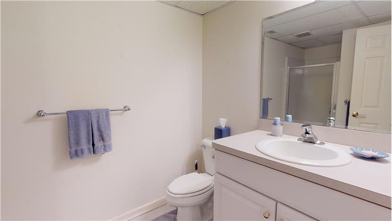 Full bath in basement is right off the kitchen! There are also 2 very large separate storage areas in the basement!