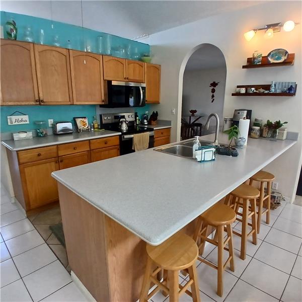kitchen area with bar seating