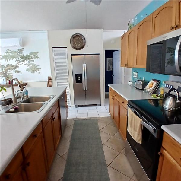kitchen cooking area with new appliances