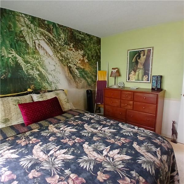 Bedroom in front of house off foyer area