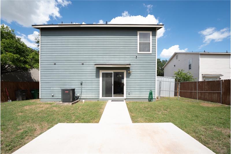 Exterior Back with Tool Shed to the right