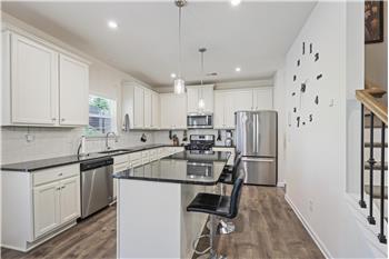Large center island featured in kitchen