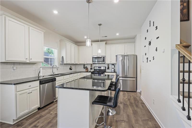 Large center island featured in kitchen