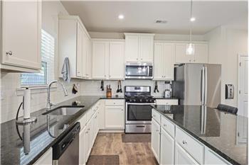 Ample cabinet space for storage even under center island