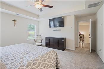 Opposite view of primary bedroom