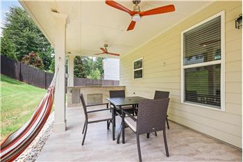 Covered patio off rear of home