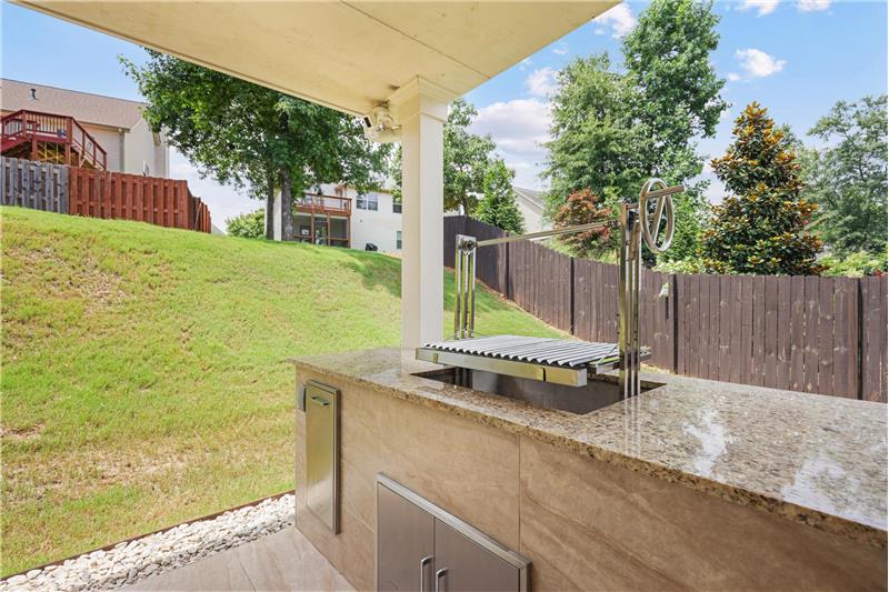 Custom built cook station featuring Santa Maria grill
