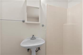 Secondary bath with step-n shower