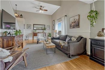The Living Room also has chair railing and a lighted ceiling fan.