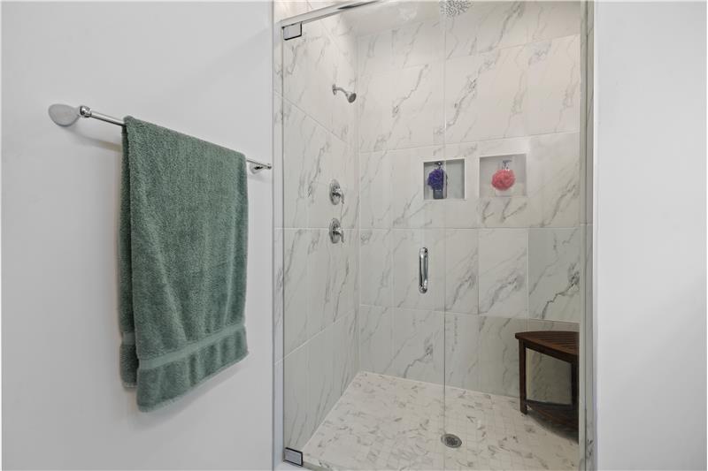Semi-frameless shower with tile surround