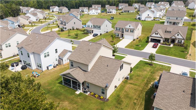 Aerial view of home and neighborhood