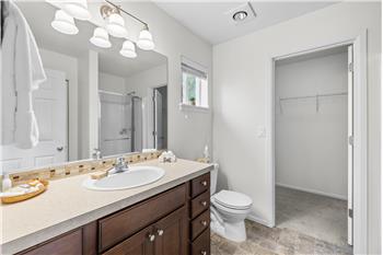 Primary Bathroom with walk in closet