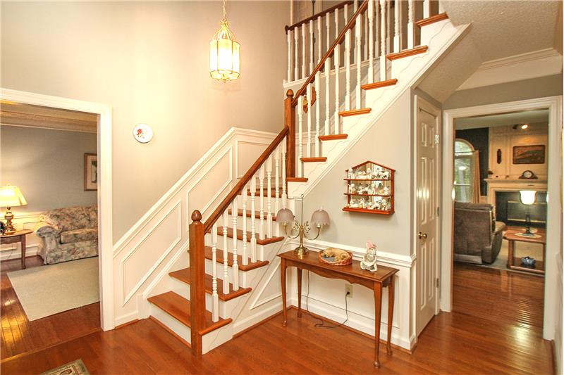 Stunning turned staircase with wood treads