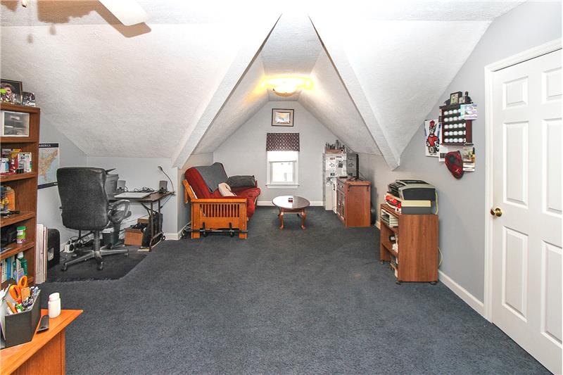 Large walk-in closet with attic access