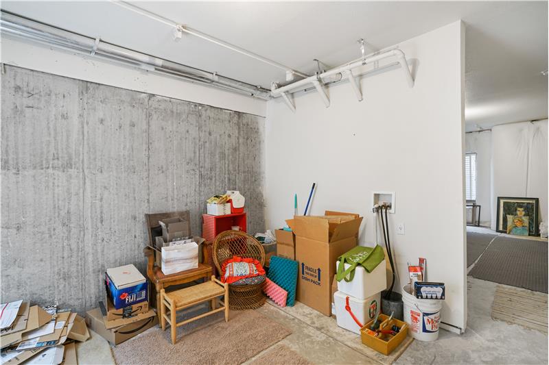 Unfinished basement has laundry hookups not used by seller