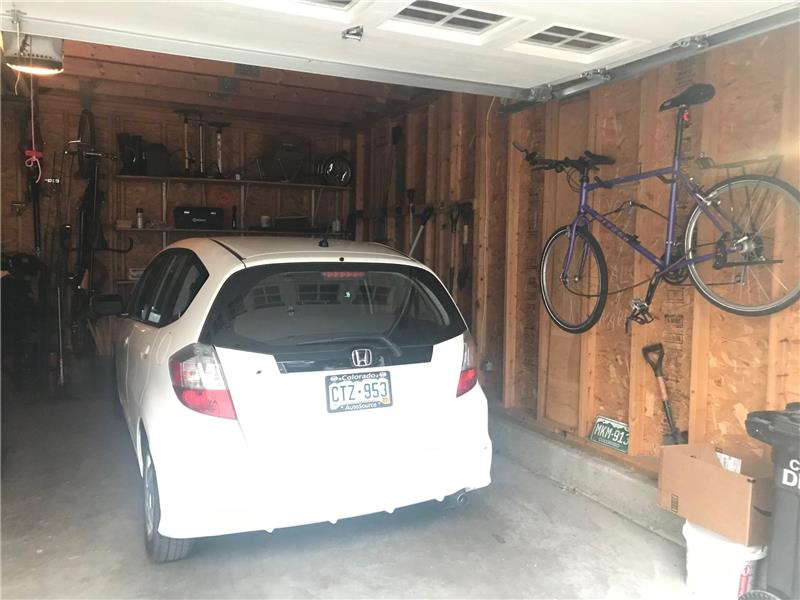 Inside the half of the garage belonging to this unit.