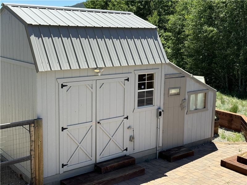 Workshop shed and attached greenhouse