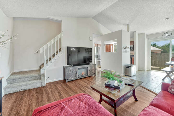The Living Rm leads into the Dining Rm & Kitchen
