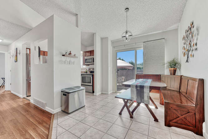 The Dining Rm leads into the Kitchen