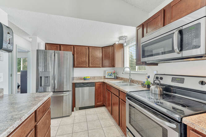 The Kitchen features Stainless Steel Appliances