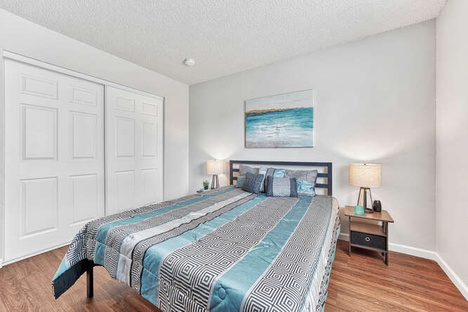 Main Level Bedroom #1 w/ Wood Laminate Floors