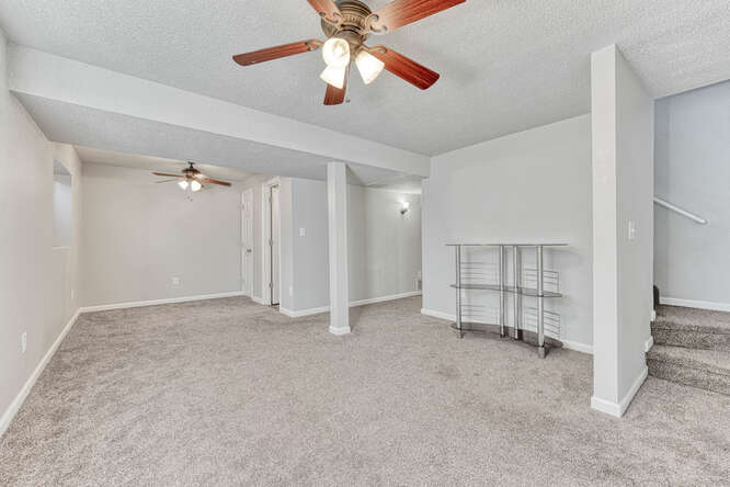 Basement Family Room w/ Lighted Ceiling Fan