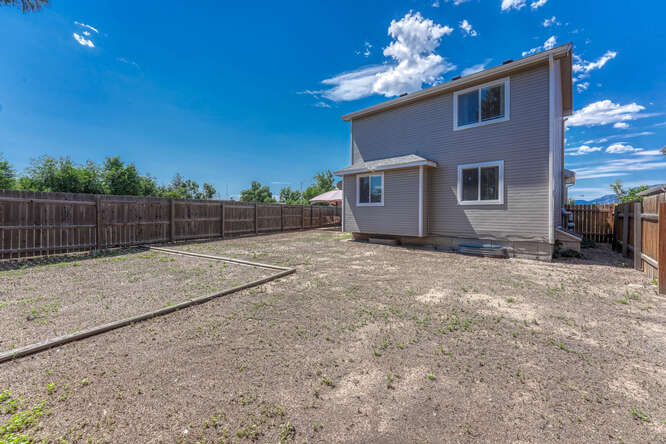 Large fenced Backyard