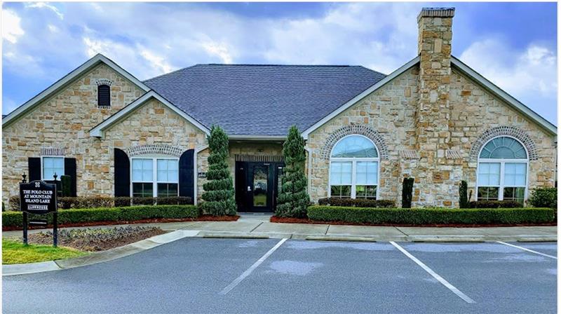 Home is situated across the street from the well-appointed community clubhouse with fitness center