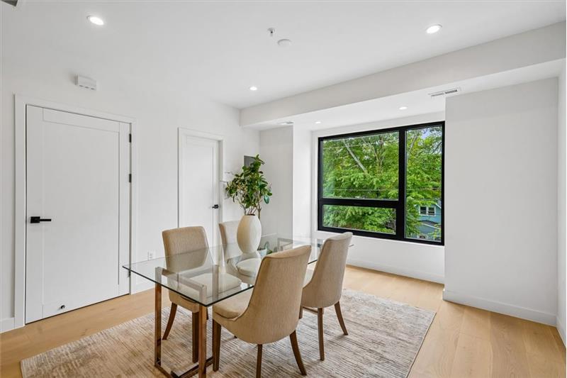 Bright and spacious dining room featuring beautiful southern natural light.