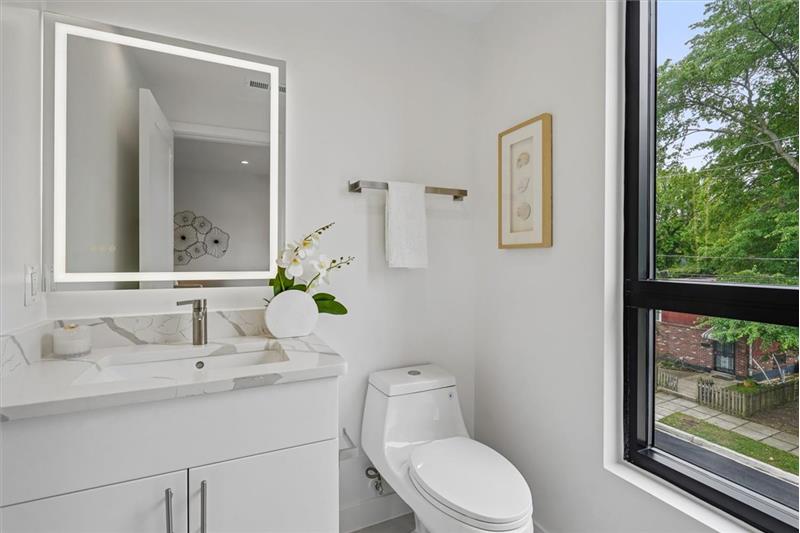 Conveniently located half bathroom on the main level.