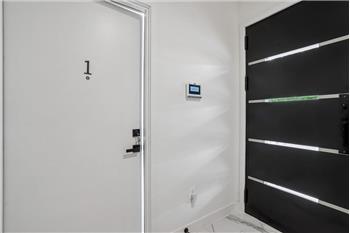 Inviting ground-floor main entrance to Unit 1 a 2 Br Rental Unit