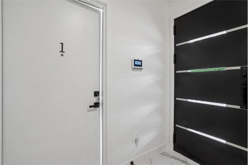 Inviting ground-floor main entrance to Unit 1 a 2 Br Rental Unit