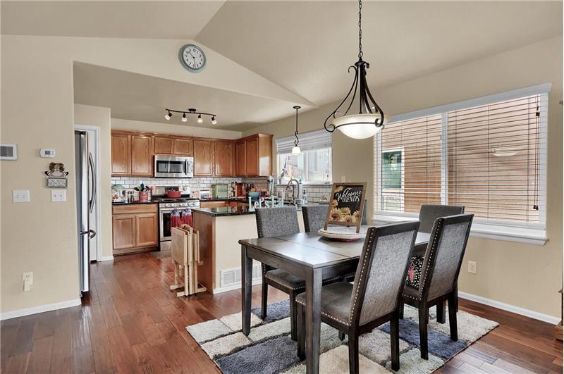 The Dining Area boasts a window and attractive light fixture