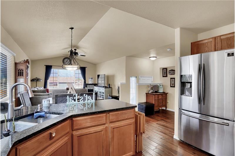 The Kitchen overlooks the Dining Area and Living Room making it easy for the chef to be part of the party