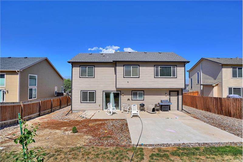 Expanded patio with a Weber round charcoal grill to relax & enjoy the Colorado sunshine & outdoor fun