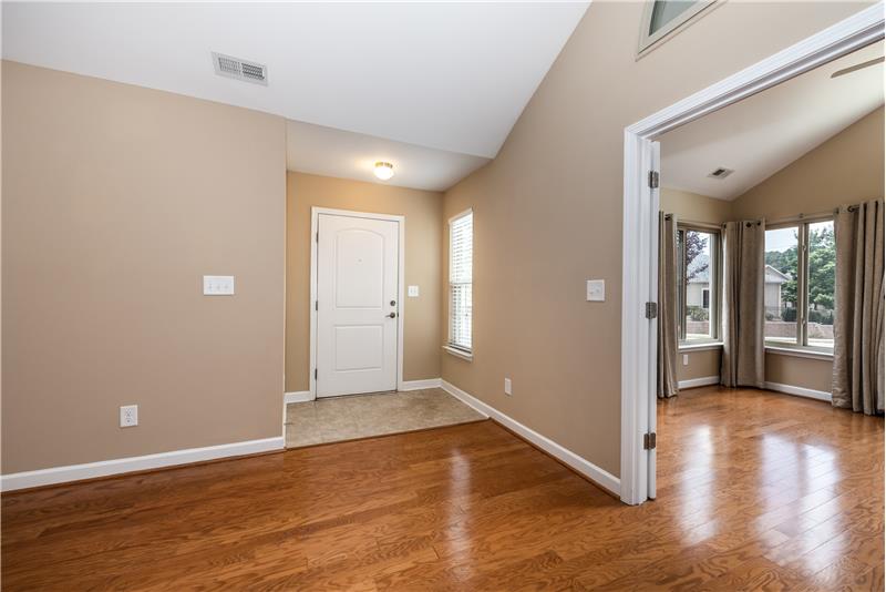 Windowed foyer provides a bright entry to the home.