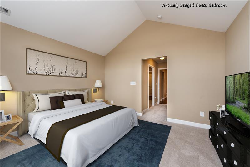 Virtually staged guest bedroom... home's split bedroom plan offers privacy for guests and homeowners, alike.