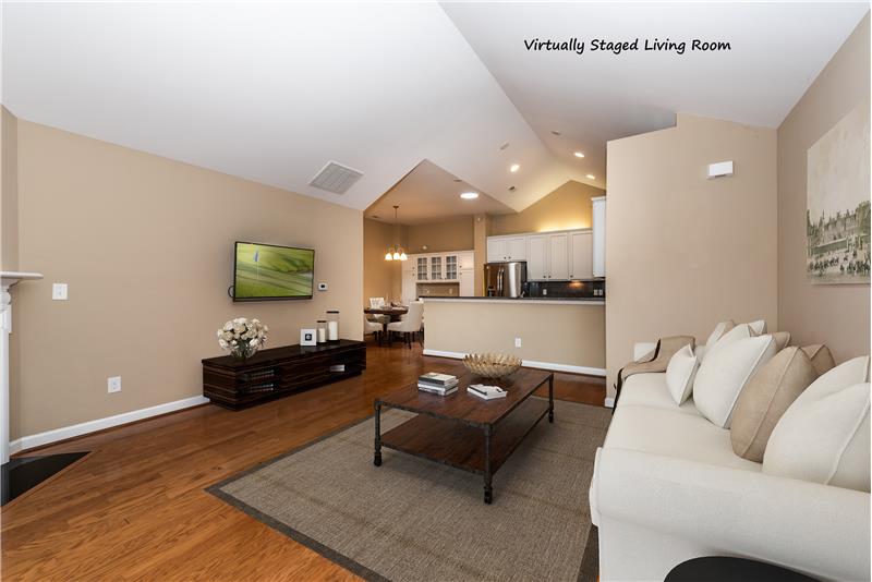 Virtually staged living room... lots of options for generous seating.