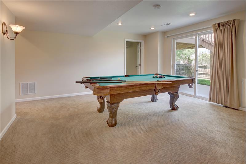 Walk-Out Rec Room with Pool Table that stays
