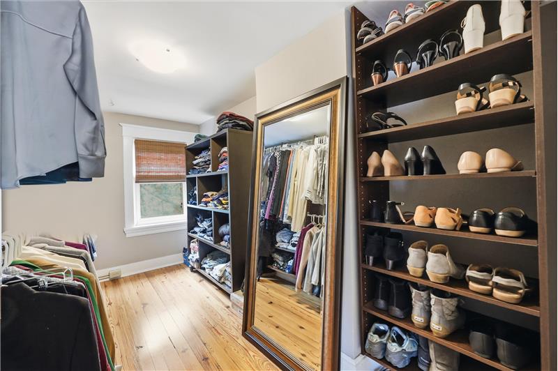 A walk-in closet with space to dress