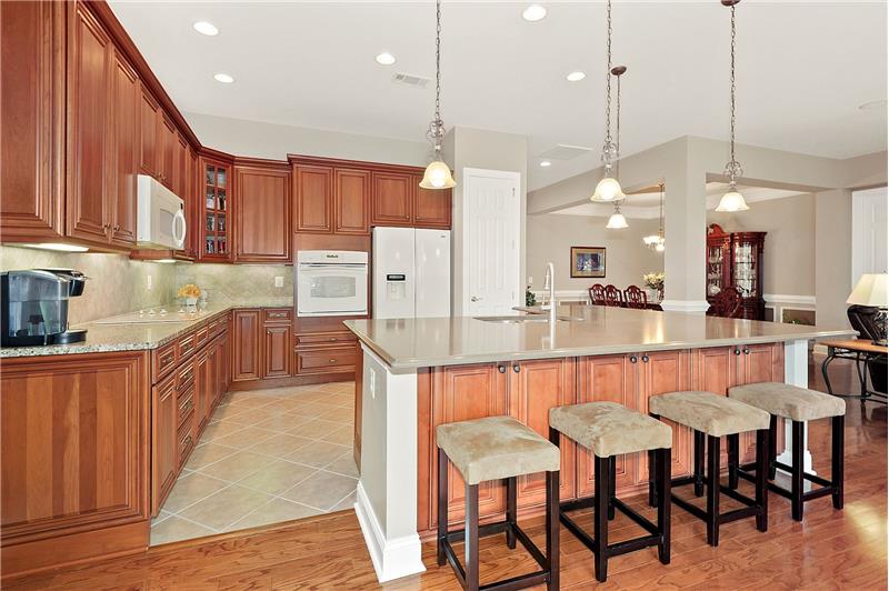 Kitchen has Contrasting Granite Counters
